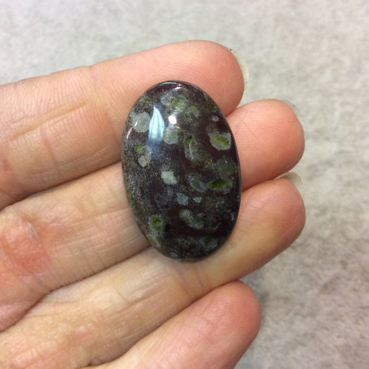 Epidote in Matrix Oblong Oval Shaped Flat Back Cabochon - Measuring 19mm x 31mm, 4.5mm Dome Height - Natural High Quality Gemstone