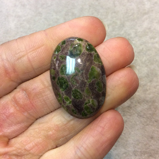 Epidote in Matrix Oblong Oval Shaped Flat Back Cabochon - Measuring 23mm x 34mm, 6mm Dome Height - Natural High Quality Gemstone