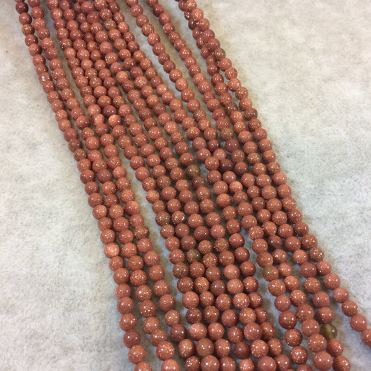 4mm Smooth Manmade Goldstone (Glass) Round/Ball Shaped Beads - Sold by 14.75" Strands (Approximately 99 Beads) - Synthetic Gemstone