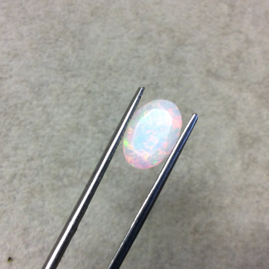 2.555 Carat Faceted Genuine Ethiopian Opal Oval Cut Stone "F-N" - Measuring 9mm x 12.5mm with 5.5mm Pavillion (Base) and 0.5mm Crown (Top)
