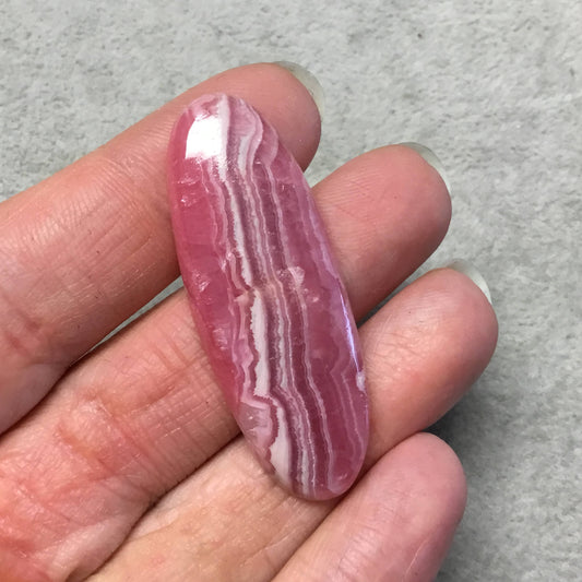 OOAK AAA Rhodochrosite Oblong Oval Shaped Flat Back Cabochon "12" - Measuring 18mm x 50mm, 5mm Dome Height - Natural High Quality Gemstone