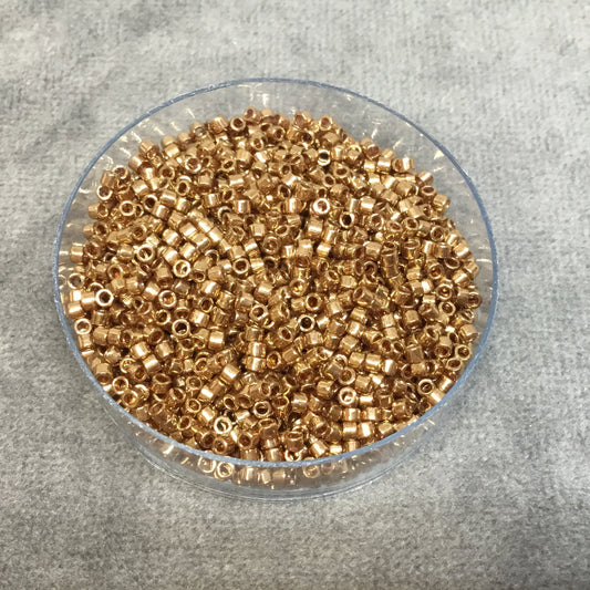 Size 11/0 Glossy Metallic Light Bronze Genuine Miyuki Delica Glass Seed Beads - Sold by 7.2 Gram Tubes (Approx. 1300 Beads per 2" Tube)