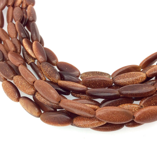 7mm x 15mm Smooth Manmade Goldstone Elongated Oval Shaped Beads with 1mm Holes - Sold by 14.5" Strands (Approx. 22 Beads)