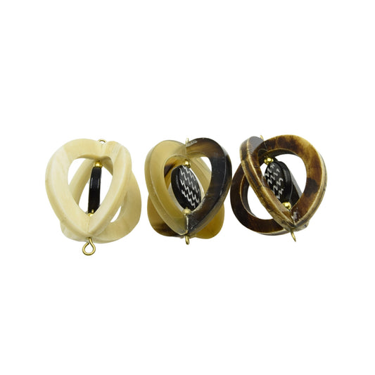 Spinning Optical Pendent- Available in Bone, Horn- Measuring 57mmx46mm Approx -Sold individually