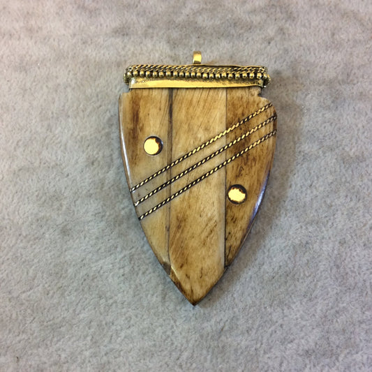 2.5" Light Brown Rounded Arrow Shaped Natural Ox Bone Pendant with Gold Line/Dot Inlay and Dotted Cap - Measuring 47mm x 65mm - (TR25LBRALI)