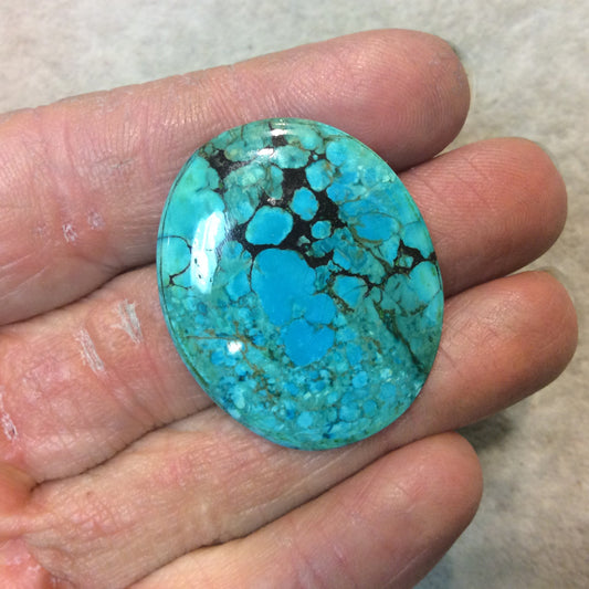 Chinese Stabilized Turquoise Oblong Oval Shaped Flat Back Cabochon - Measuring 29mm x 36mm, 4mm Dome Height - Natural High Quality Gemstone