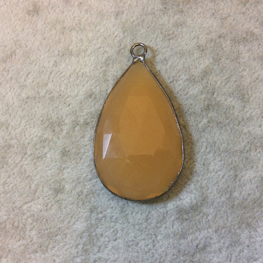 Gunmetal Finish Faceted Light Orange Chalcedony Teardrop Shaped Bezel Pendant - Measuring 28mm x 47mm - Natural Semi-precious Gemstone
