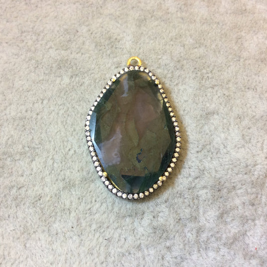 Gold Finish CZ Cubic Zirconia Rimmed Faceted Natural Moss Agate Freeform Oval Shape Bezel Pendant - Measures 24mm x 34mm