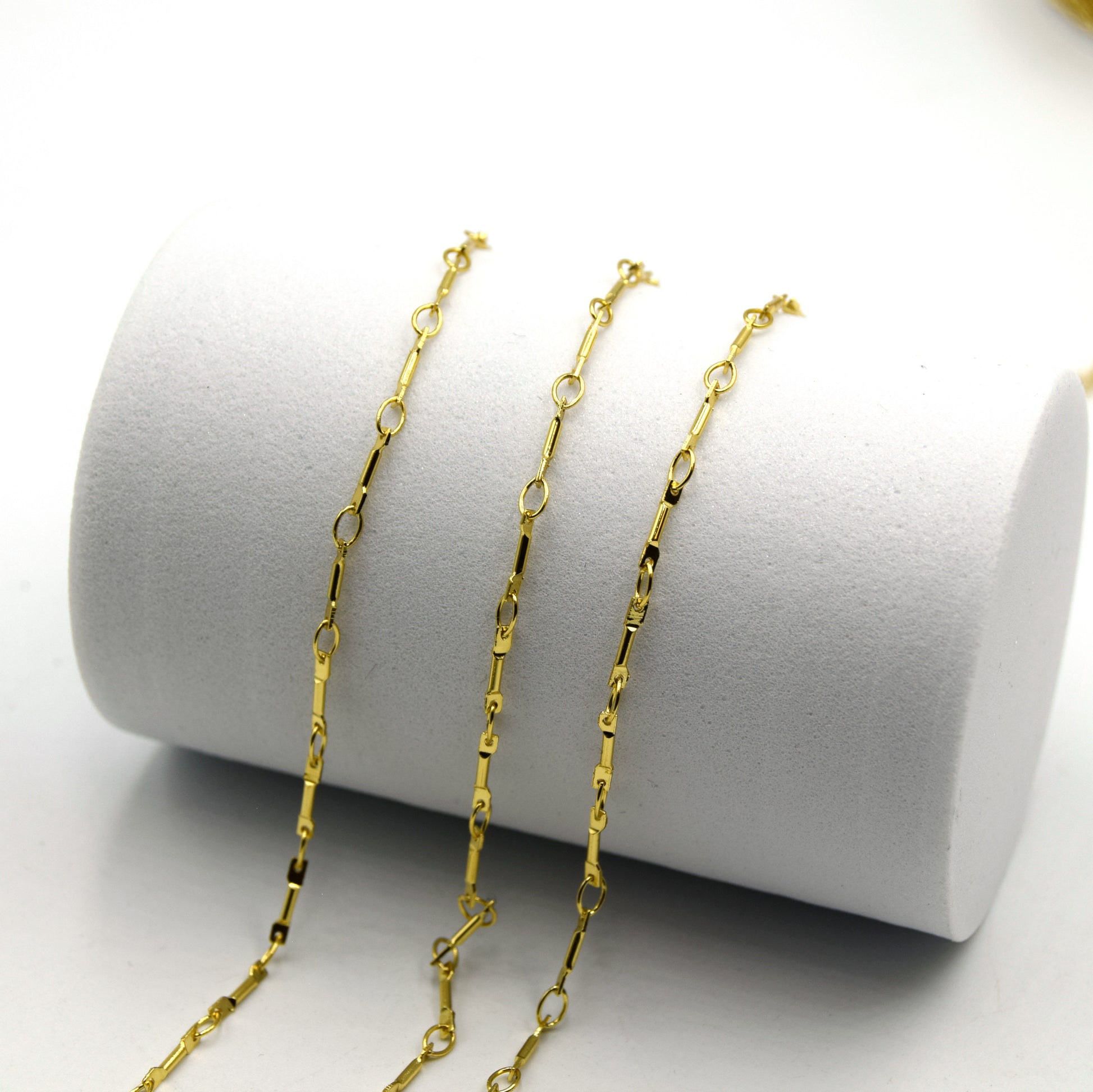 This is a picture of gold plated bar link chain that is used in jewelry making
