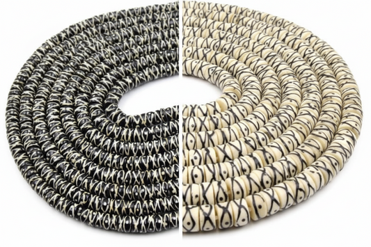 "Black and white batik heishi bone beads with tribal X dot pattern, coiled strands showing both colorways, 5mm heishi shape"