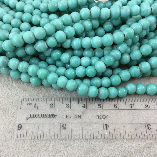7mm Glossy Teal Blue/Green Quality Irregular Rondelle Shape Indian Ceramic Beads - Sold by 16.25" Strand - Approximately 64 Beads