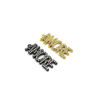 gold and black cubic zirconia charms shaped into the word "Amore", perfect for expressing your love and affection.