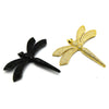 A comparison of two different pendants. On the left, a detailed gold dragonfly pendant with wings spread wide, while on the right, a detailed black dragonfly pendant with wings spread wide