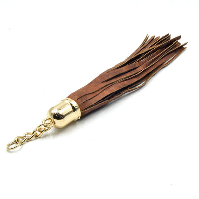 gold dome cap brown leather tassel