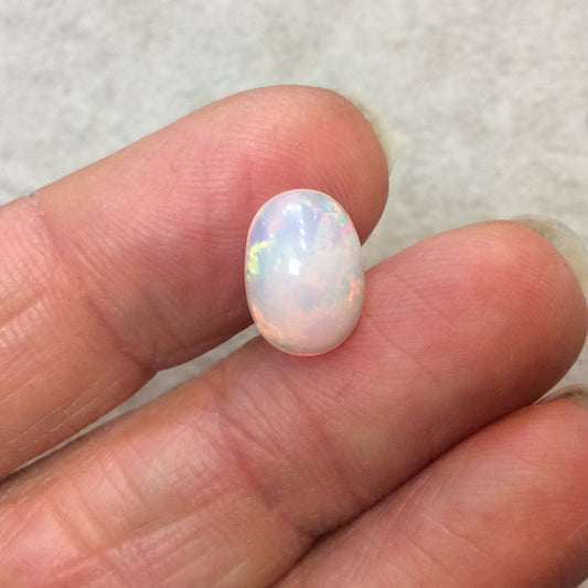 Natural Ethiopian Opal Smooth Oval Shaped Flat Back Cabochon 'K' - Measuring 9mm x 12mm, 5.5mm Dome Height - High Quality Gemstone Cab