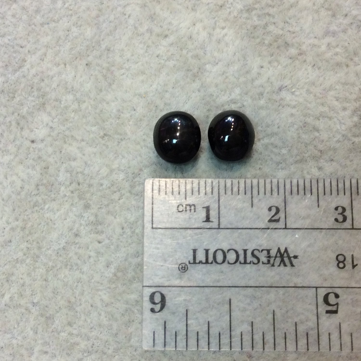 Matching Pair "G" of AAA Oval Shaped Black Star Sapphire Flat Back Cabochons - Measuring 7mm x 8mm, 5mm Dome Height - Natural Gemstone Cabs