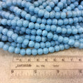 7mm Glossy Turquoise Blue Quality Irregular Rondelle Shape Indian Ceramic Beads - Sold by 16.25" Strand - Approximately 64 Beads