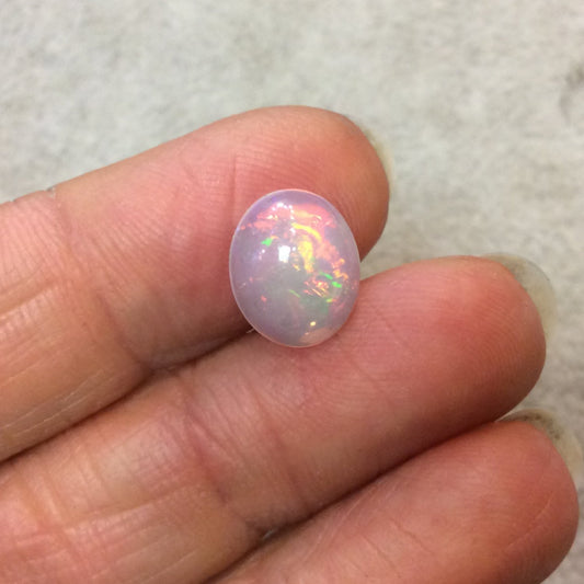 Natural Ethiopian Opal Smooth Oval Shaped Flat Back Cabochon 'I' - Measuring 10mm x 12mm, 5mm Dome Height - High Quality Gemstone Cab