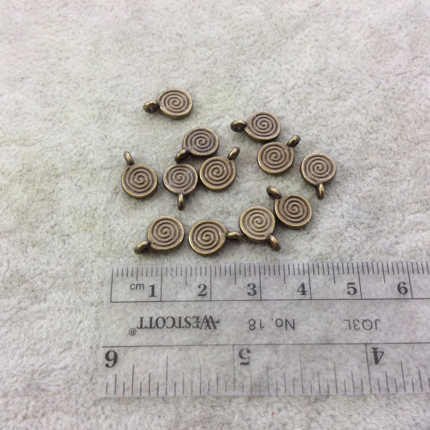 Bulk Pack of 8mm Antique Brass Plated Tibetan Silver Detailed Swirl/Spiral Engraved Round Shaped Focal Charms/Pendants - Sold in Packs of 12