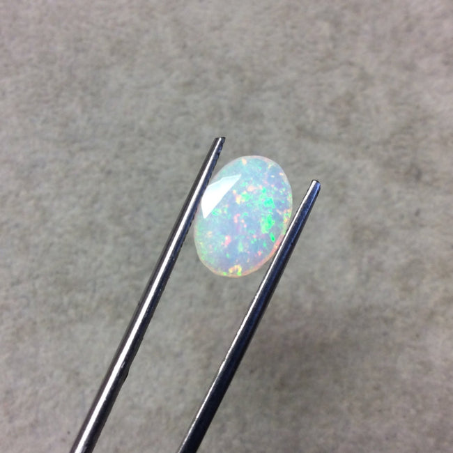 2.44 Carat Faceted Genuine Ethiopian Opal Oval Cut Stone "F-O" - Measuring 9.5mm x 13.5mm with 3.5mm Pavillion (Base) and 0.75mm Crown (Top)