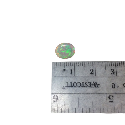 1.385 Carat Faceted Genuine Ethiopian Opal Oval Cut Stone "F-S" - Measuring 8mm x 10mm with 4.5mm Pavillion (Base) and 1mm Crown (Top)