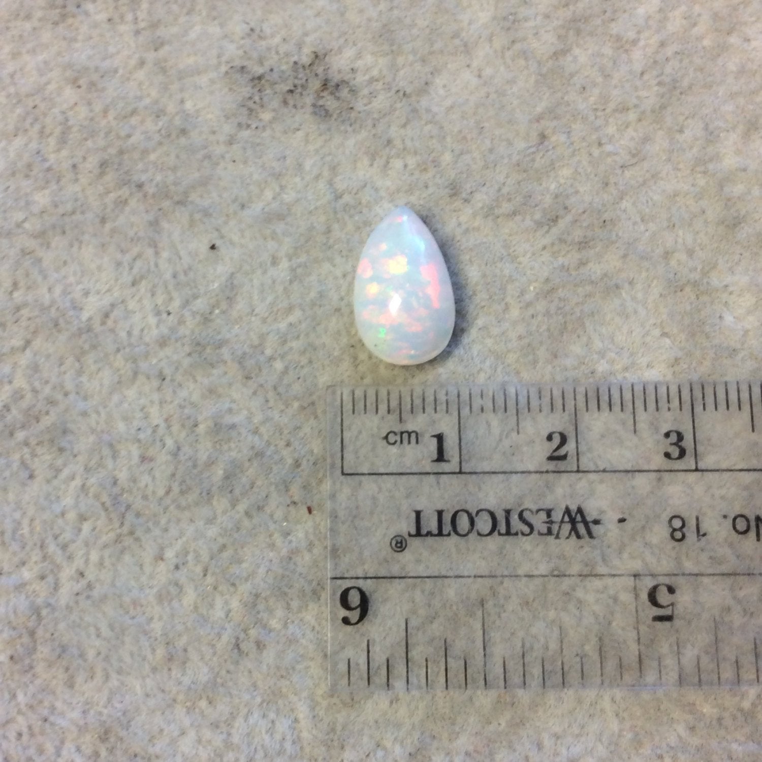 Natural Ethiopian Opal Smooth Teardrop Shaped Flat Back Cabochon 'CA' - Measuring 9mm x 14.5mm, 5mm Dome Height - High Quality Gemstone
