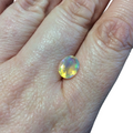 1.345 Carat Faceted Genuine Ethiopian Opal Oval Cut Stone "F-C" - Measuring 8mm x 10mm with 4mm Pavillion (Base) and 1mm Crown (Top)