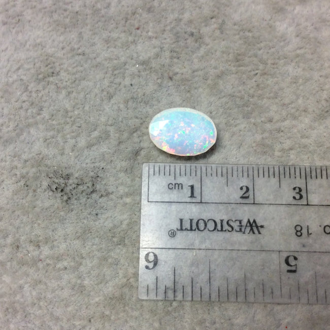 2.44 Carat Faceted Genuine Ethiopian Opal Oval Cut Stone "F-O" - Measuring 9.5mm x 13.5mm with 3.5mm Pavillion (Base) and 0.75mm Crown (Top)