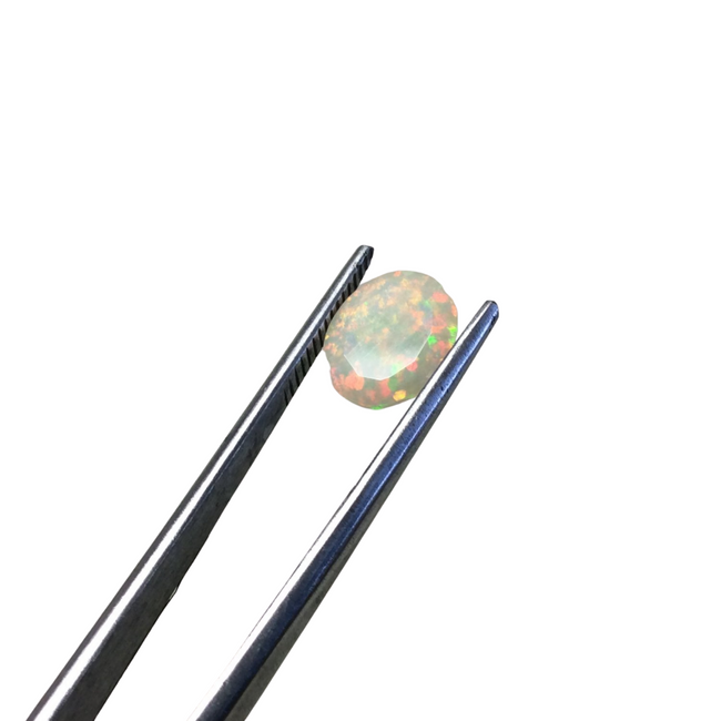 1.715 Carat Faceted Genuine Ethiopian Opal Oval Cut Stone "F-T" - Measuring 8mm x 10mm with 4.5mm Pavillion (Base) and 1mm Crown (Top)