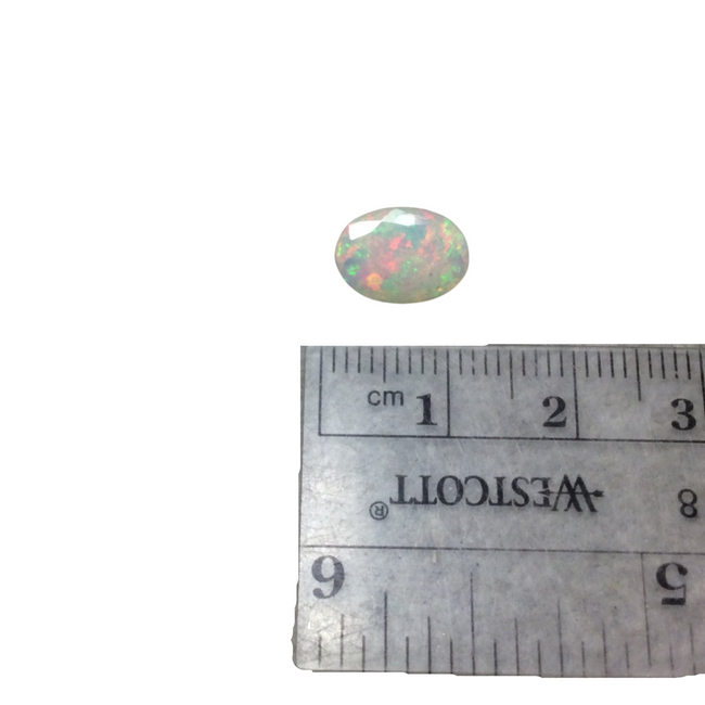 1.74 Carat Faceted Genuine Ethiopian Opal Oval Cut Stone "F-U" - Measuring 8mm x 11mm with 4mm Pavillion (Base) and 1mm Crown (Top)