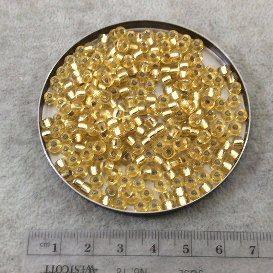 Size 6/0 Glossy Finish Silver Lined Light Gold Genuine Miyuki Glass Seed Beads - Sold by 20 Gram Tubes (Approx. 200 Beads/Tube) - (6-9002)