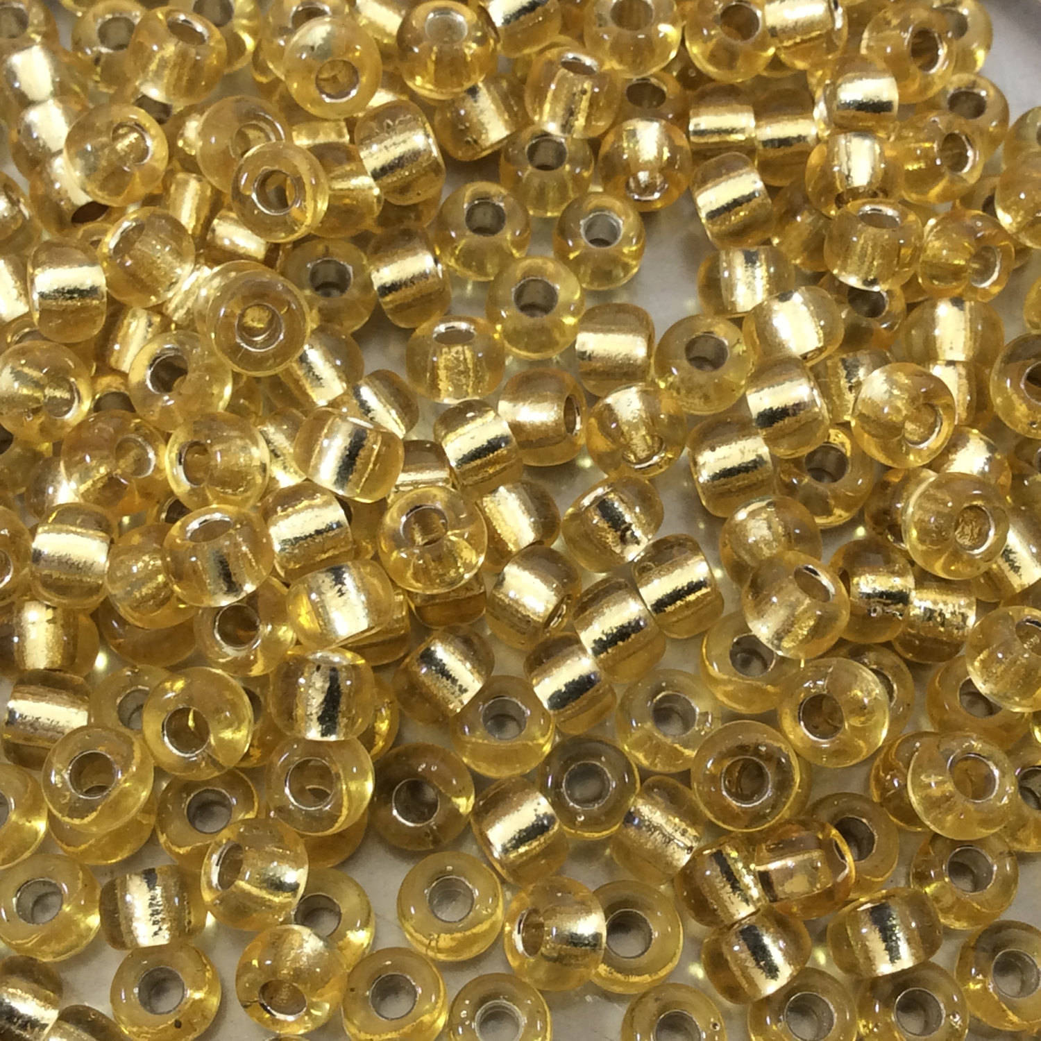 Size 6/0 Glossy Finish Silver Lined Light Gold Genuine Miyuki Glass Seed Beads - Sold by 20 Gram Tubes (Approx. 200 Beads/Tube) - (6-9002)