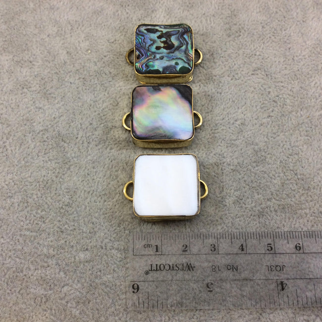 1" Iridescent Rainbow Natural Abalone Shell Square Shaped Gold Plated Bezel Connector - Measuring 23mm x 23mm.