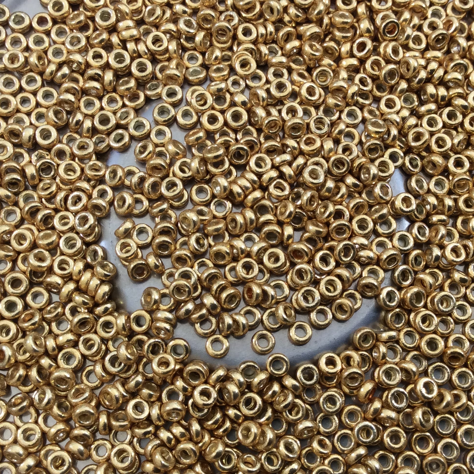 1mm x 2mm Glossy Galvanized Gold Genuine Miyuki Glass Seed Spacer Beads - Sold by 7 Gram Tubes (Approx 770 Beads per Tube) - (SPR2-4202)