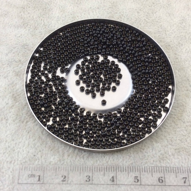 Size 11/0 Glossy Finish Black Coated Brass Seed Beads with 1.1mm Holes - Sold by 2", 13 Gram Tubes (Approx. 700 Beads per Tube) - (MT11-BLK)