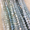 6-7mm Glossy Finish Natural Light Blue Aquamarine Round/Ball Shaped Beads with 1mm Holes - Sold by 15.5" Strands (Approximately 56 Beads)
