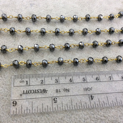 Gold Plated Copper Wrapped Rosary Chain with 4mm x 6mm Faceted Natural Hematite Rondelle Shaped Beads - Sold by the Foot!