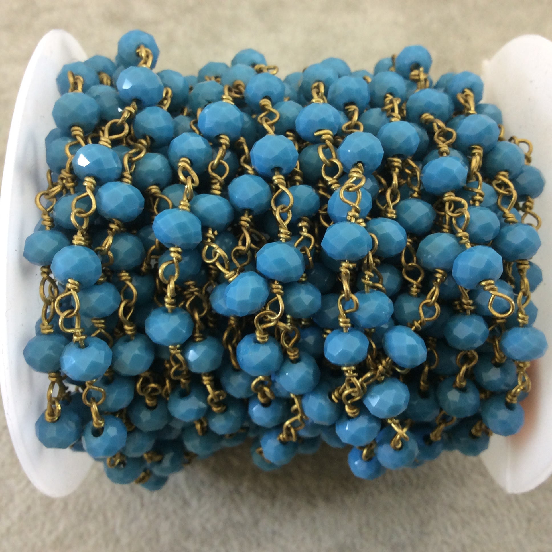Brass Plated Copper Wrapped Rosary Chain with 6mm Faceted Opaque Dk. Turquoise Glass Crystal Rondelle Beads - By the Foot (RC46-056B-BR)