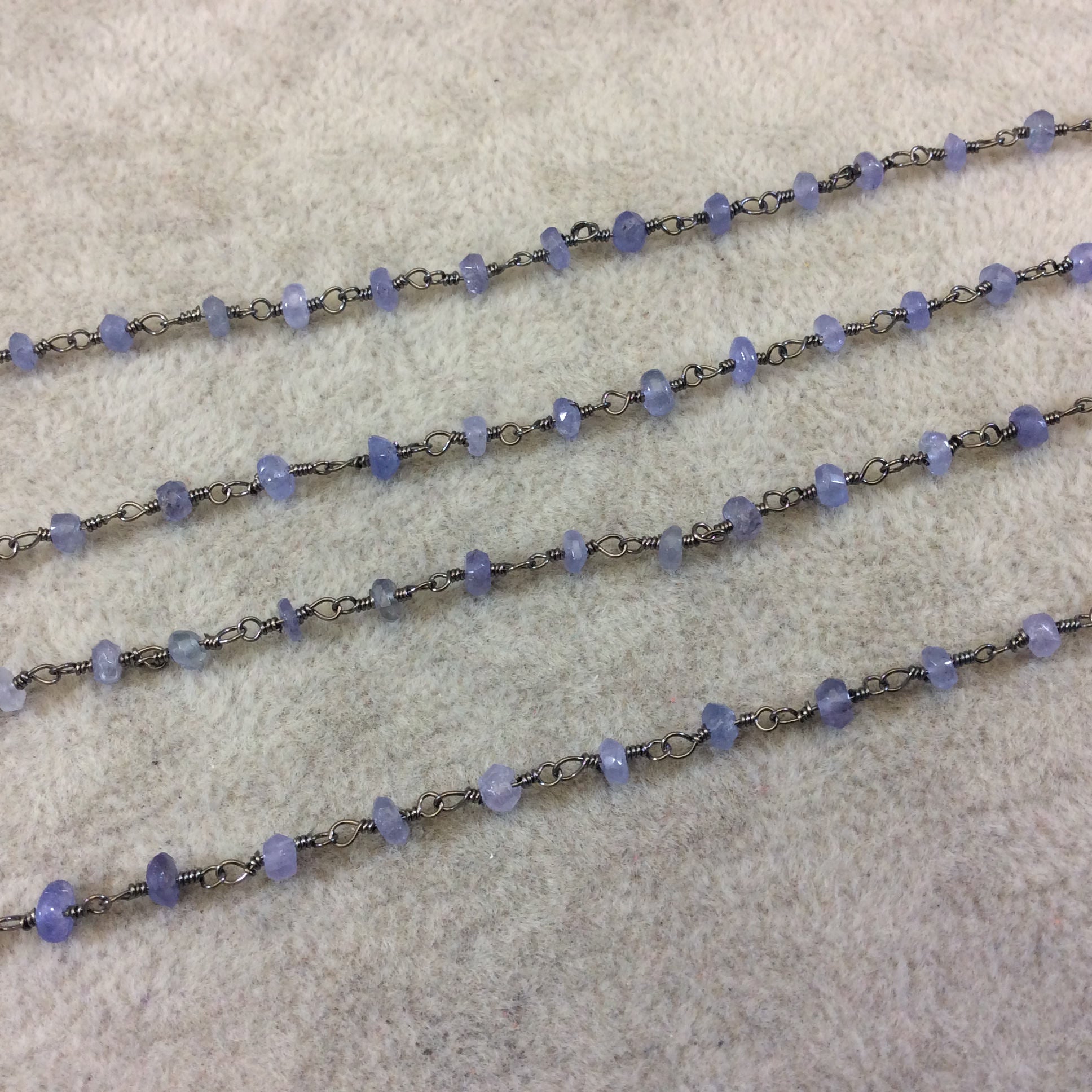 Gunmetal Plated Copper Rosary Chain with Faceted 3-4mm Rondelle Shaped Mystic Coated Medium Blue Moonstone Beads - Sold Per Ft - CH143-GM