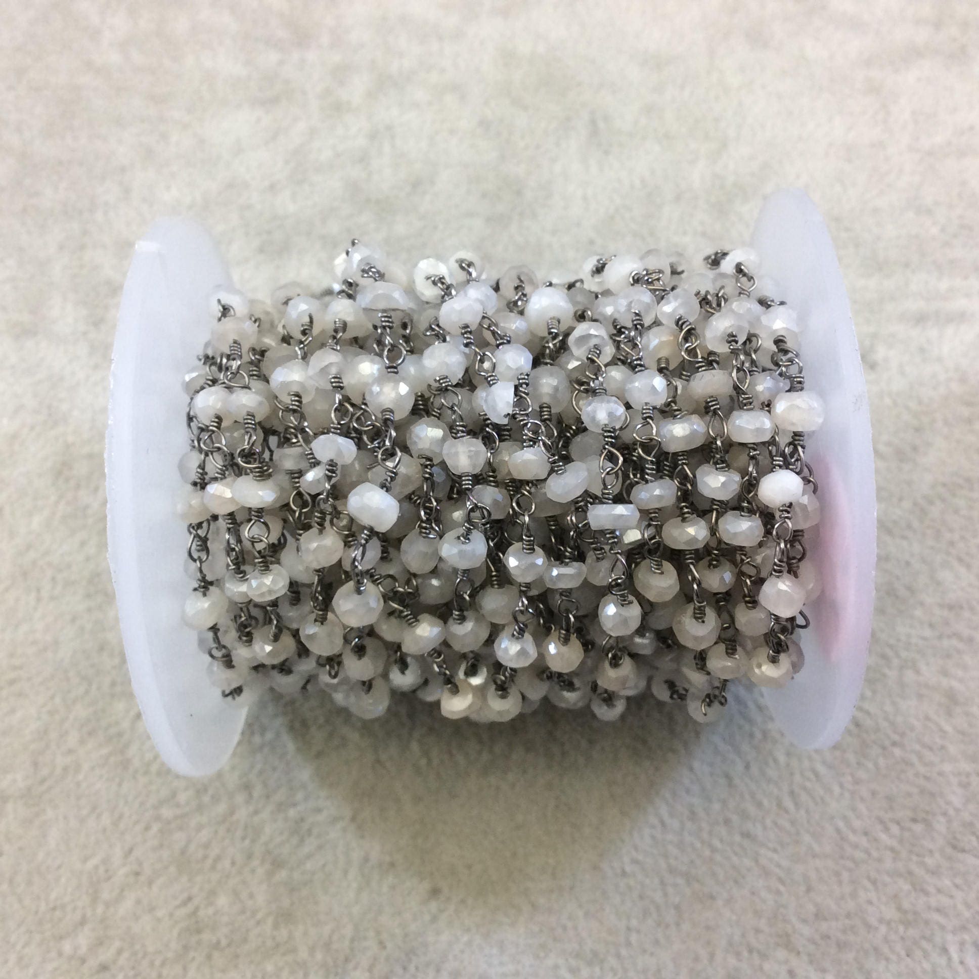 Gunmetal Plated Copper Rosary Chain with Faceted 3-4mm Rondelle Shaped Mystic Coated Gray/White Moonstone Beads - Sold Per Ft - CH147-GM