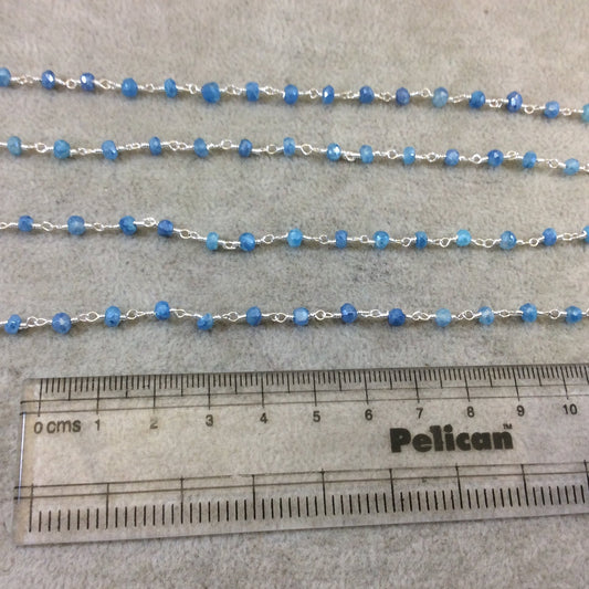 Silver Plated Copper Rosary Chain with Faceted 3-4mm Rondelle Shaped Mystic Coated Medium Blue Moonstone Beads - Sold Per Ft - CH143-SV