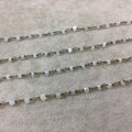 Gunmetal Plated Copper Rosary Chain with Faceted 3-4mm Rondelle Shaped Mystic Coated Gray/White Moonstone Beads - Sold Per Ft - CH147-GM