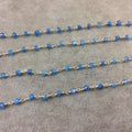 Silver Plated Copper Rosary Chain with Faceted 3-4mm Rondelle Shaped Mystic Coated Medium Blue Moonstone Beads - Sold Per Ft - CH143-SV