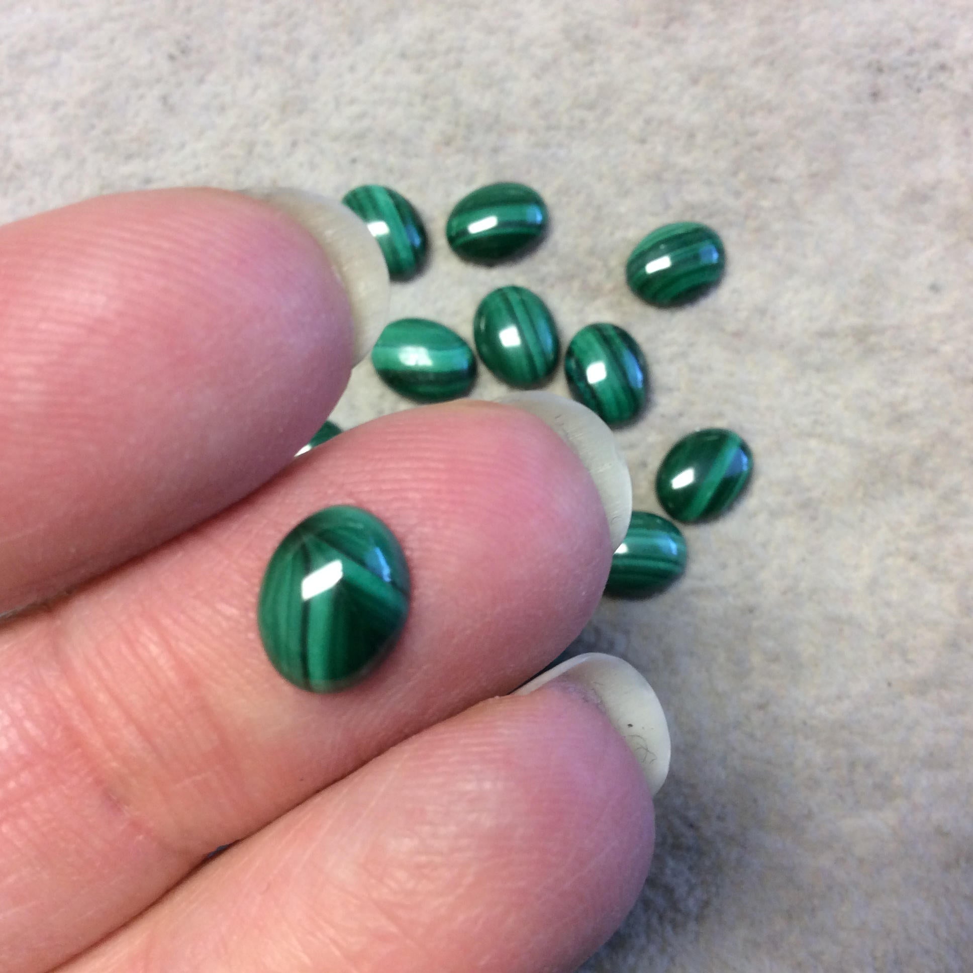 BULK LOT of Six (6) Assorted Oval Shaped AAA Malachite Flat Back Cabochons - Measuring 7mm x 9mm, 3mm Dome Height - Randomly Selected