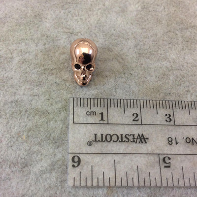 Rose Gold Plated CZ Cubic Zirconia Inlaid Skull Shaped Bead With Black CZ Eyes - Measures 10mmx13mm, Approx. - Sold Individually, RANDOM