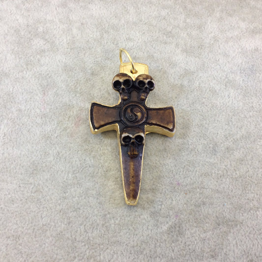 2.5" Gold Electroplated Brown/White Three Skull Cross Shaped Lightweight Resin Pendant  - Measuring ~ 40mm x 65mm - Sold Individually