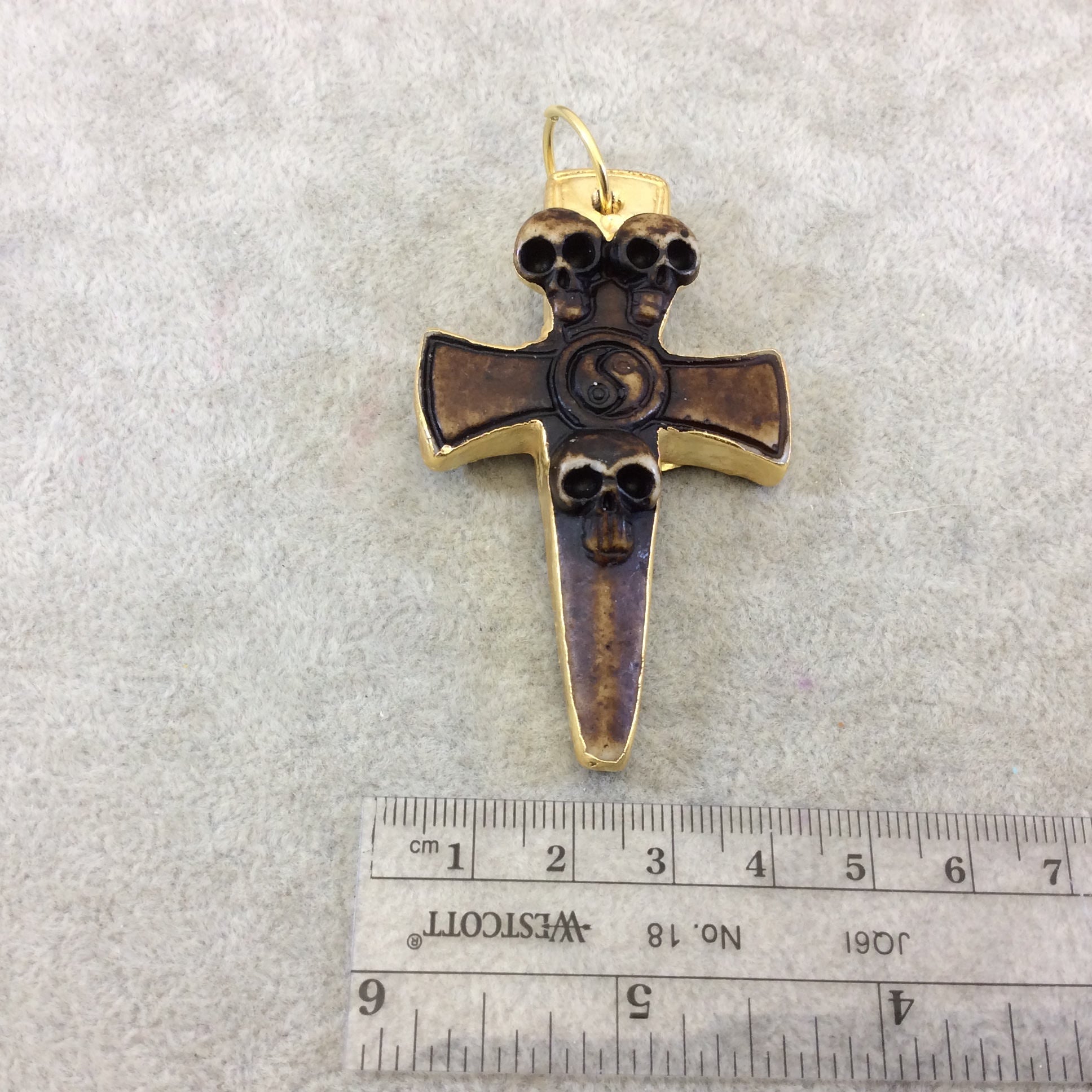 2.5" Gold Electroplated Brown/White Three Skull Cross Shaped Lightweight Resin Pendant  - Measuring ~ 40mm x 65mm - Sold Individually