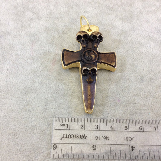 2.5" Gold Electroplated Brown/White Three Skull Cross Shaped Lightweight Resin Pendant  - Measuring ~ 40mm x 65mm - Sold Individually