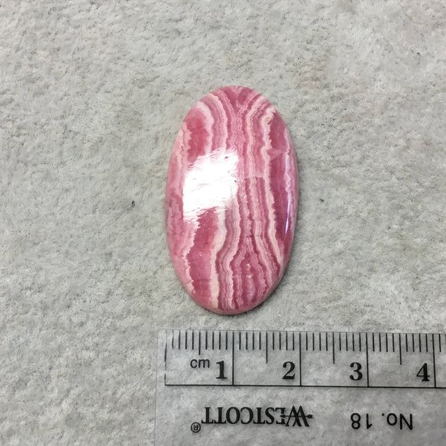 OOAK AAA Rhodochrosite Oblong Oval Shaped Flat Back Cabochon "7" - Measuring 21mm x 36mm, 5mm Dome Height - Natural High Quality Gemstone
