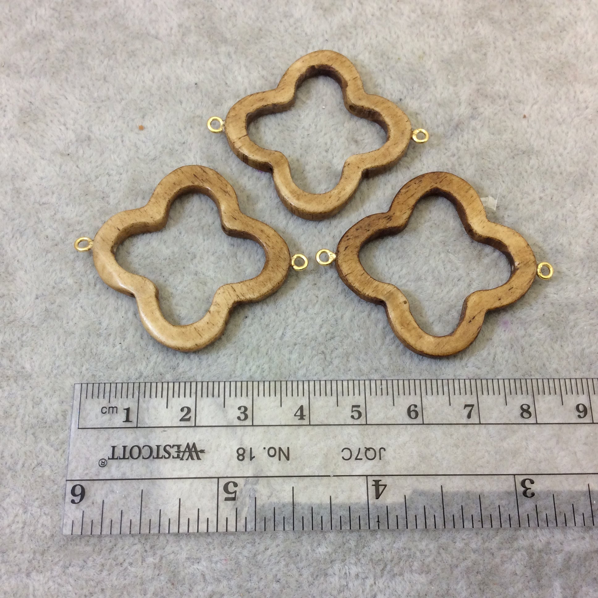 Medium Light Brown Open Quatrefoil Shaped Natural Ox Bone Connector with Attached Gold Suspension Rings - Measuring 36mm x 36mm, Approx.